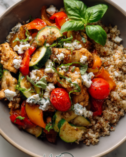 Searing diced chicken breast in a pan for a quick Mediterranean stir fry recipe.